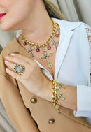 Pulseira Adriana com pingentes de cruz banhada no dourado