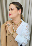 Pulseira Adriana com pingentes de cruz banhada no dourado