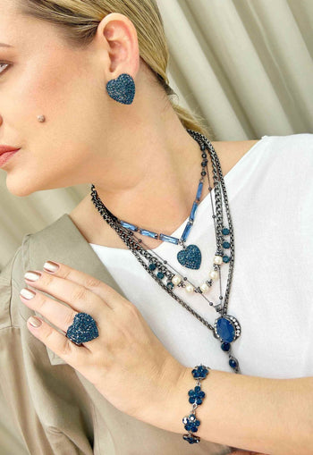 Anel Mabele montana de coração com pedras azuis