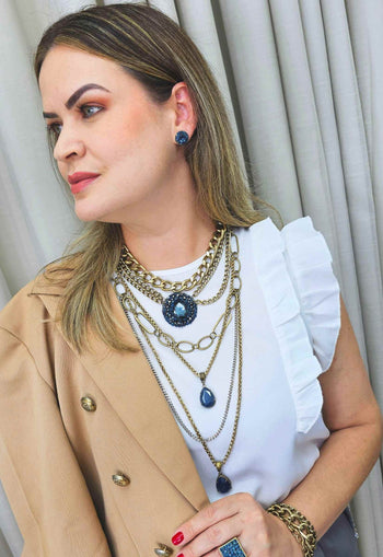 Brinco vick Sanui azul banhado no ouro velho