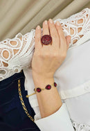 Anel Rubi Glam dourado com pedras vermelhas