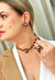 Colar choker Dara com pingente de flor vintage e perola