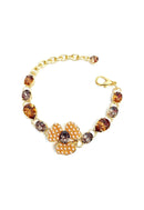 Pulseira Florência com pingente de flor e pedras champagne