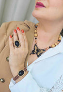 Pulseira Doce Transformação vintage com pingente de pedra preta