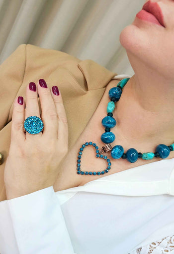 Anel Preciosa redondo com pedras azuis banhado no vintage