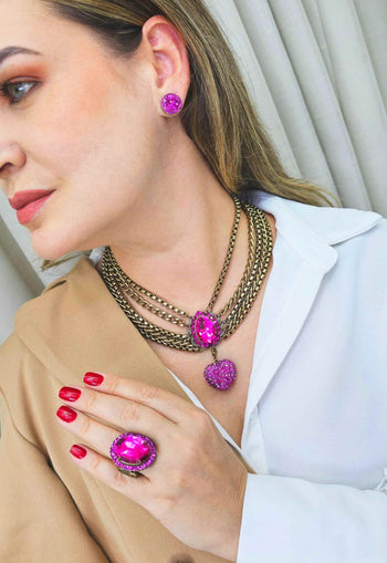 Brinco Maria Isabel oval com pedras fuchsias banhado no ouro velho