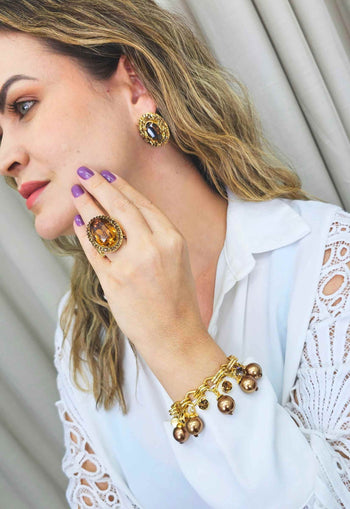 Brinco Gerusa gold oval com pedras marrom banhado no dourado