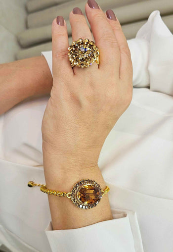 Anel Angelita Gold redondo com pedras douradas