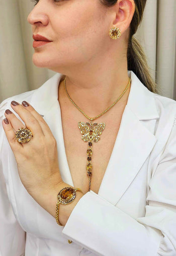 Anel Angelita Gold redondo com pedras douradas