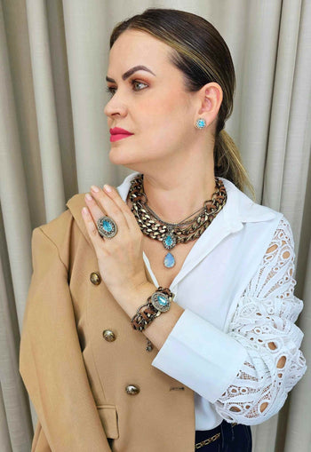 Brinco Vick Helena ouro velho com pedras azuis