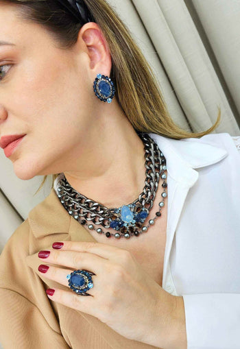 Anel Divinidade onix com pedras azuis