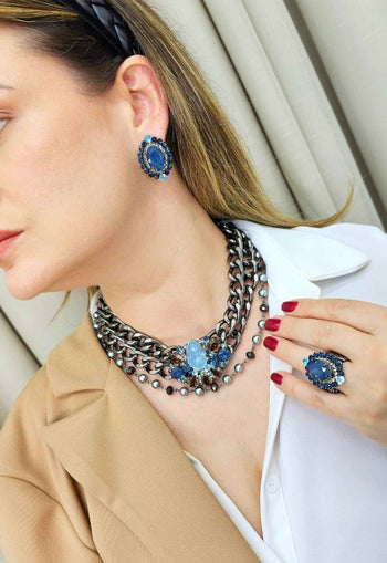 Anel Divinidade onix com pedras azuis