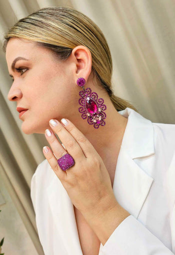 Anel Glorioso com pedras fucsias banhado no grafite