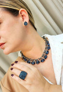 Brinco Elizia montana de gota com strass montana banhado no grafite