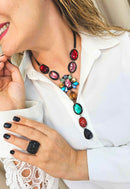 Anel Estela retangular com pedras pretas banhado no onix