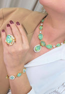 Anel Euforia de pedras verde menta e strass cristal banhado no dourado