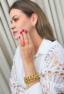 Anel Valquíria oval com pedra coral e strass light peach banhado no dourado