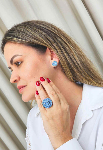 Anel Oceânica redondo de pedras azuis banhado no prata