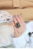 Anel Presença ouro velho oval com strass hematite