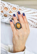 Anel Expressão oval de pedras azuis e mostrada banhado no ouro velho