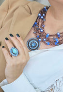 Anel momentos jeans oval com pedras azuis banhado no vintage