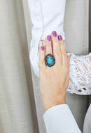 Anel Antônia oval de pedras azuis e black diamond banhado no ouro velho