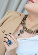 Anel Helena oval de pedra azul com black diamond banhado no ouro velho