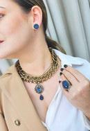 Anel Helena oval de pedra azul com black diamond banhado no ouro velho