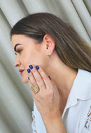 Anel Roseli oval com pedras light peach banhado no dourado