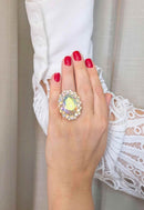 Anel Luz Divina dourado com pedras boreal