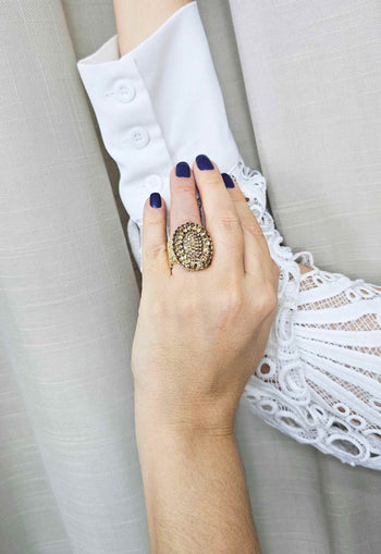 Anel Roseli oval com pedras light colorado topaz banhado no dourado