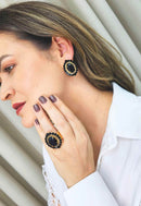 Anel Diamante Negro oval de pedras pretas banhado no dourado