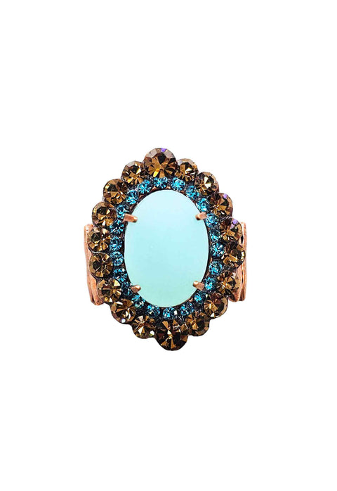 Anel Radiância com pedras marrons e tons de azuis banhado no vintage