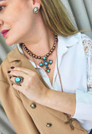 Brinco Radiância classic com pedras marrons e azuis banhado no vintage