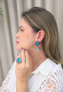 Brinco Noélia Clásico com gota e pedras azuis banhado no dourado