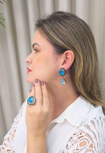 Brinco Noélia Clásico com gota e pedras azuis banhado no dourado