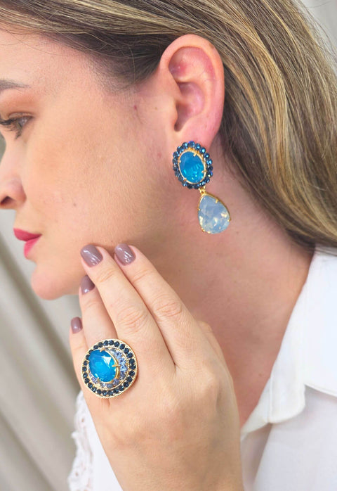 Brinco Noélia Clásico com gota e pedras azuis banhado no dourado