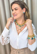 Brinco Beira-Mar de pedras azul turquesa banhado no dourado