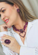 Brinco Vanguarda oval com pedras ametistas banhado no vintage