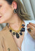 Maxi colar Diamante Negro com pingentes e pedras pretas banhado no dourado