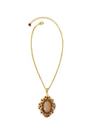 Colar Raridade dourado com pingente de strass e veneziana dourada