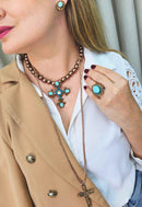 Colar Radiância com mix de pingente de cruz perolas cobreadas e strass em tons de azuis