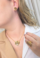Colar Sempre Viva Classic Gold de flor com strass smoked e boreal no banho dourado
