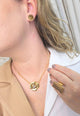 Colar Sempre Viva Classic Gold de flor com strass smoked e boreal no banho dourado