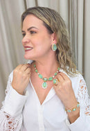 Colar Euforia Festa de pedras verde menta e strass cristal banhado no dourado