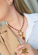 Colar Magda com pedras fendi e topaz banhado no dourado