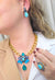 Colar Paola Turquesa: Moderno com Pedras Azuis e Correntaria no Dourado | Destaque no seu Look
