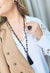 Colar Dália longuinho com tassel e bolas pretas banhado no vintage