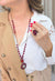 Colar Sonata: Estilo Longo com Pingente Redondo e Bolas Vermelhas | Look de Festa