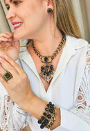 Colar Cândida ouro velho com pingente de pedras pretas e vital marrom